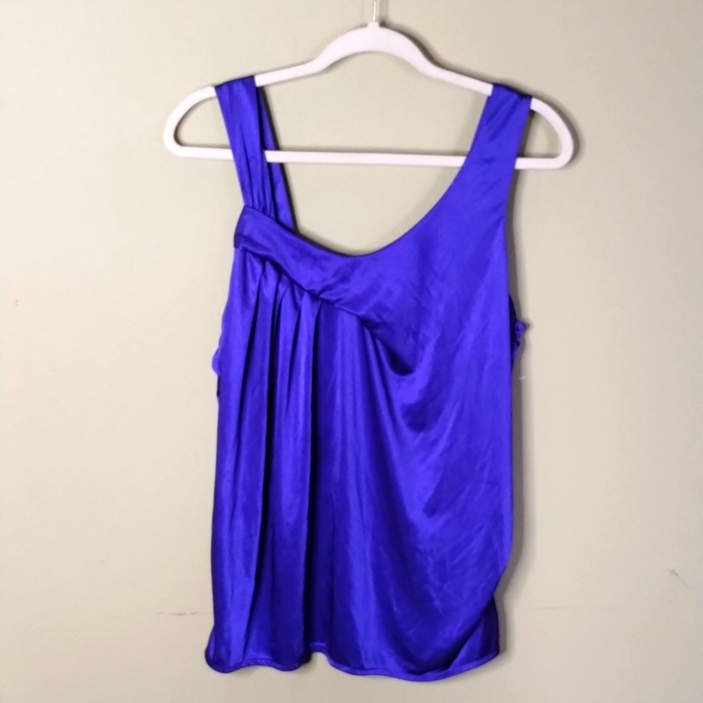 5. Jennifer Lopez Violet Sleeveless Blouse